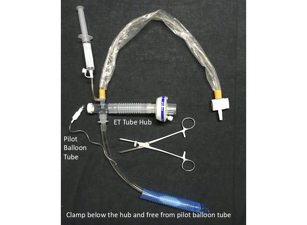 Clamp below the hub.