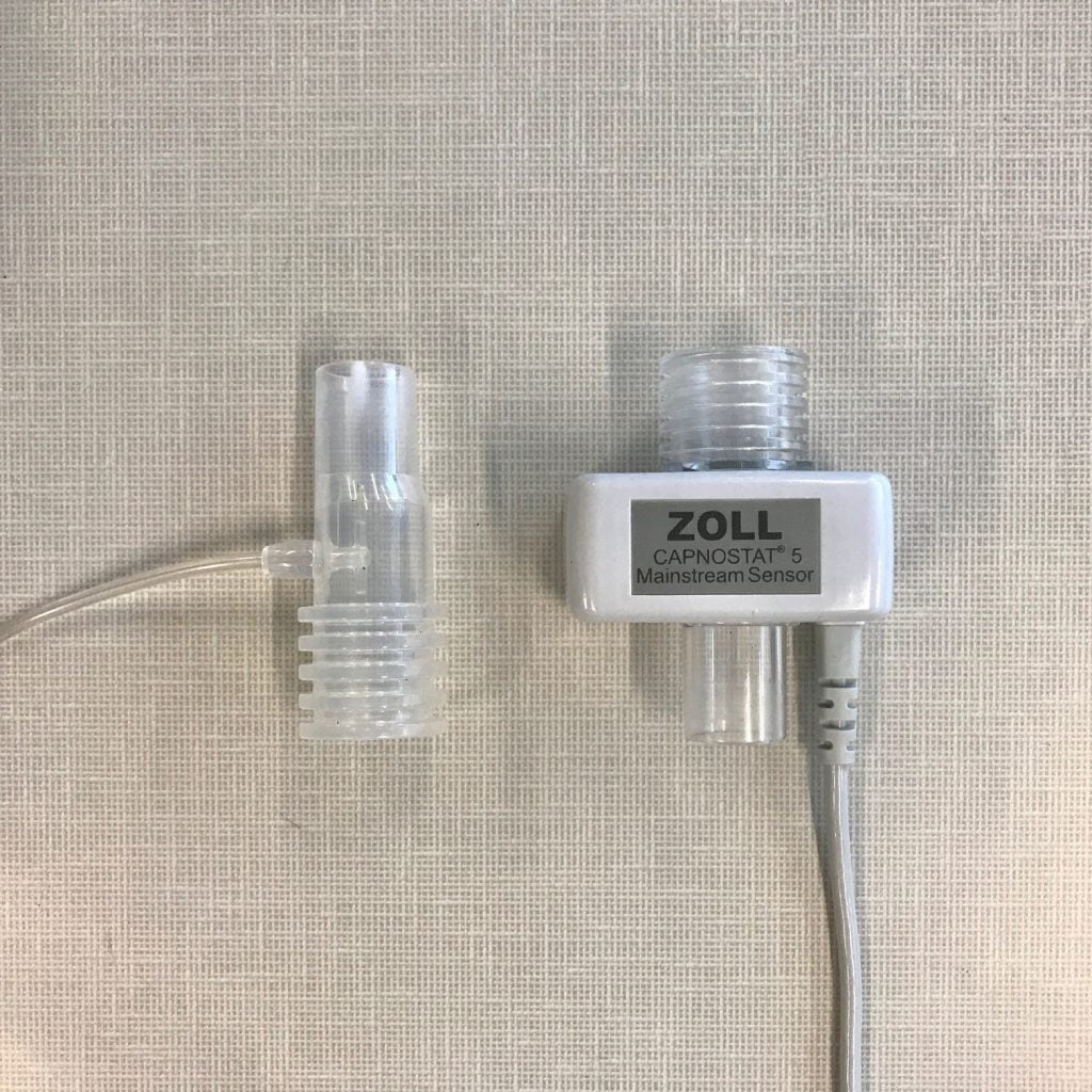 In-line sidestream EtCO2 adapter (Left) and in line mainstream EtCO2 adapter (right).