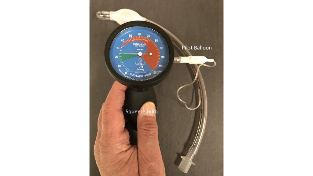 The photo shows an acceptable cuff pressure range of 24 CWP