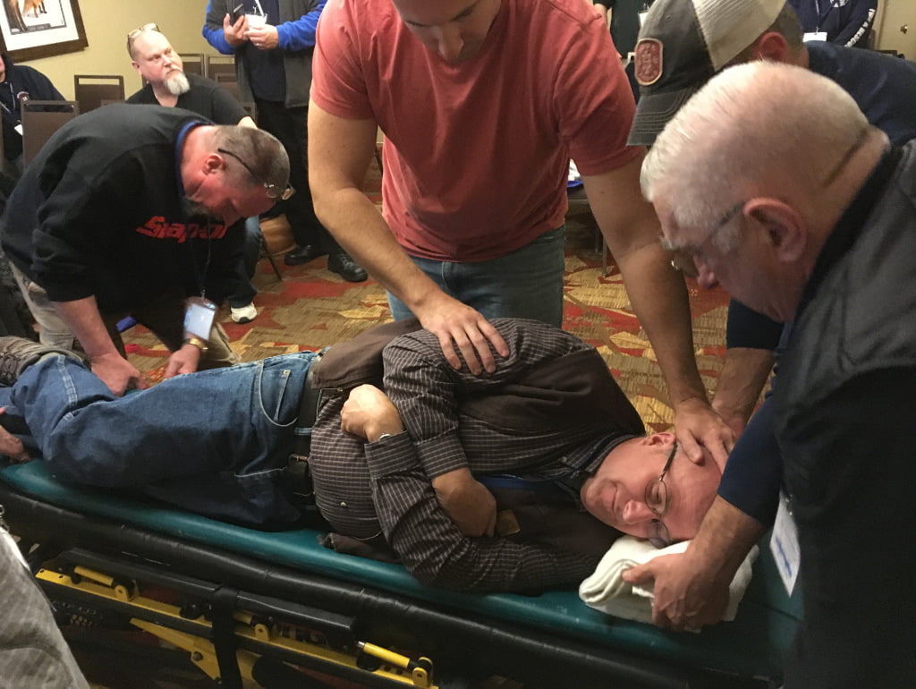 Providers practice side positioning at the Vermont EMS Conference.