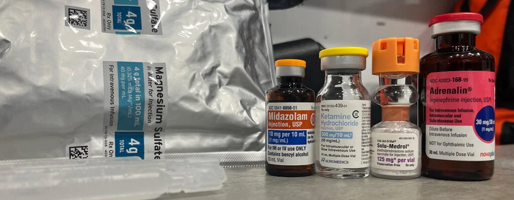 The photo shows magnesium sulfate, midazolam, ketamine, solu-medrol and adrenalin.